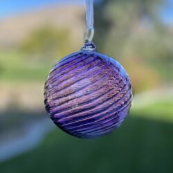 Purple swirl ornament. Cole 2023